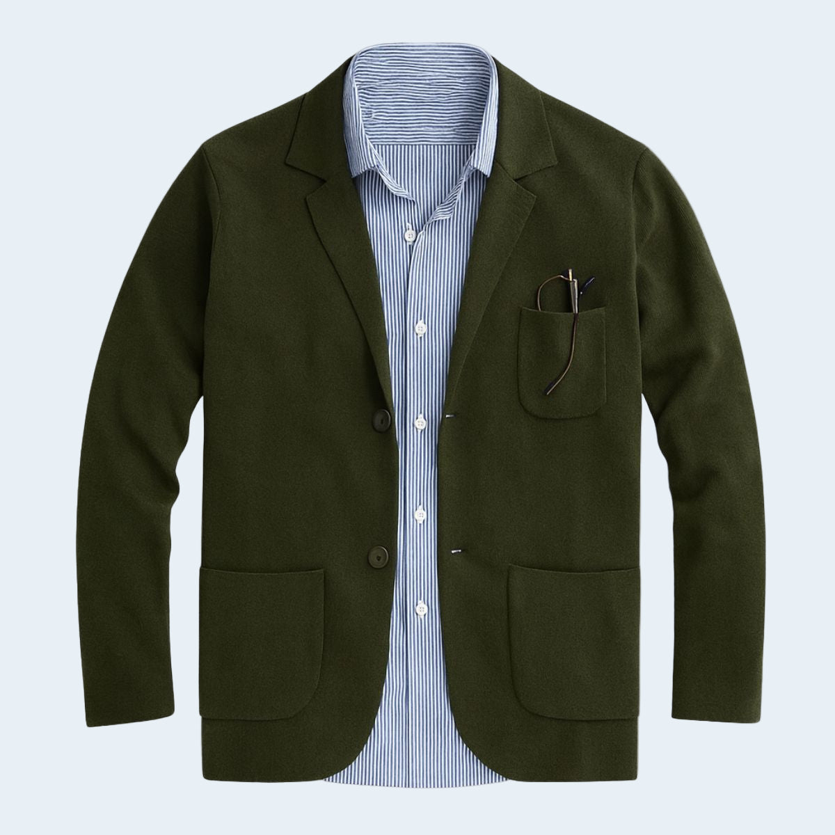 Green blazer over a striped shirt on a light gray background