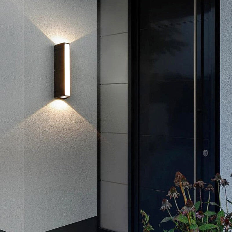 Matte Black Metal Wall Sconce with Vertical Design – Ideal for Outdoor Faucet Area by Walnut