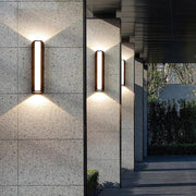 Matte Black Metal Wall Sconce with Vertical Design – Ideal for Outdoor Faucet Area by Walnut