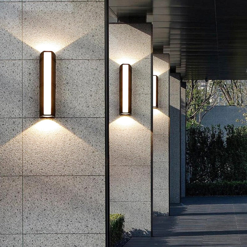 Matte Black Metal Wall Sconce with Vertical Design – Ideal for Outdoor Faucet Area by Walnut